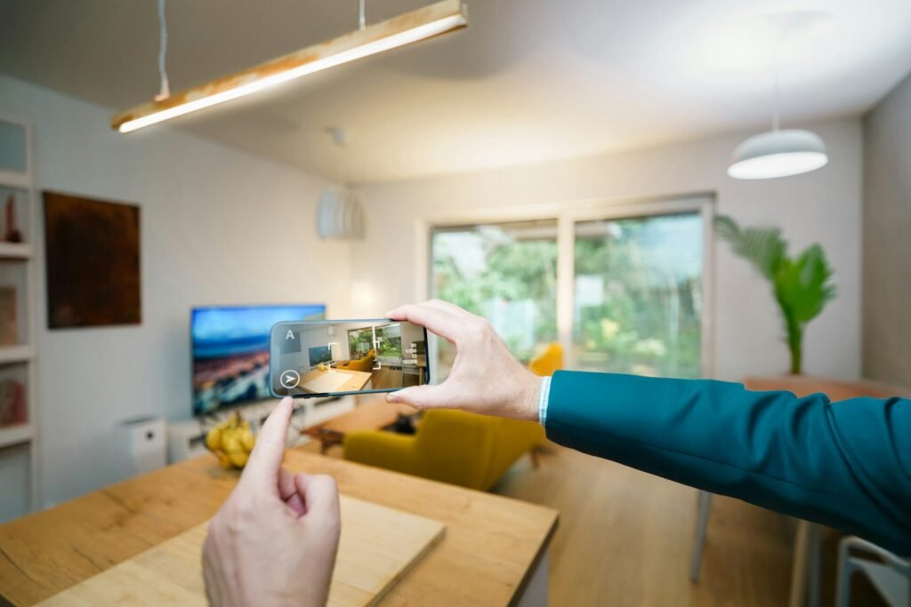 A person taking a picture of a living room